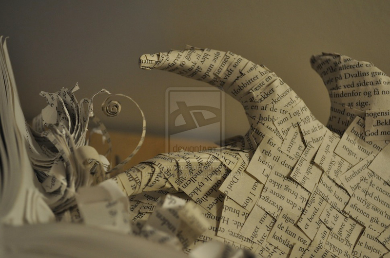 Illustration for article titled Artist Turns The Hobbit Book Into Paper Sculpture Of Smaug